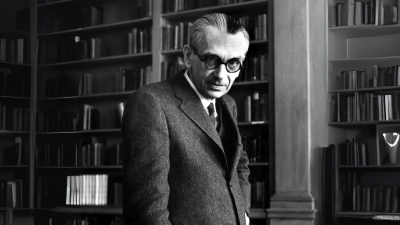 Gödel Theorems - The Proof That Formal Math Has Built In Blind Spots Black and white photo of Kurt Gödel in a library