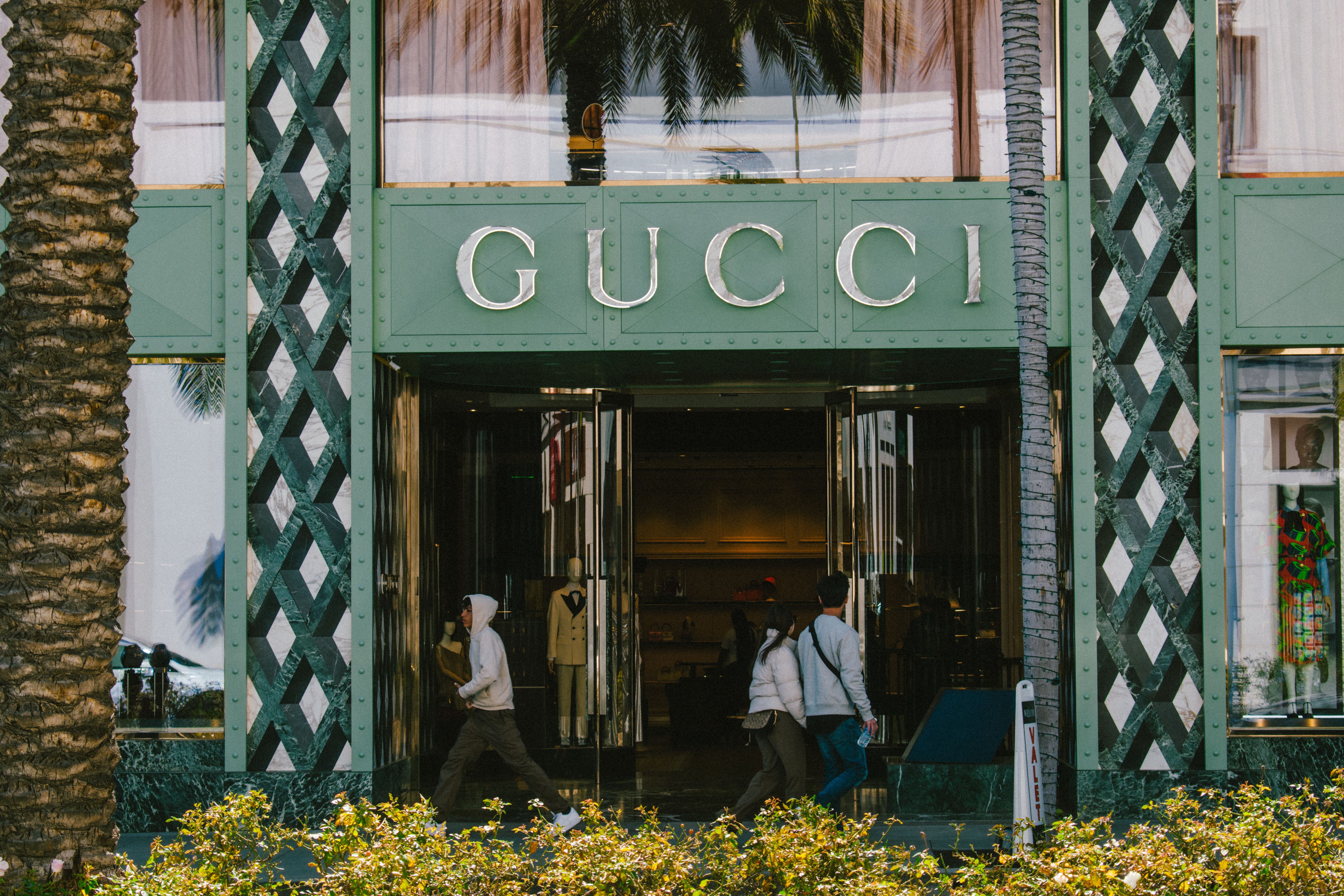 Designer luxury boutique storefront representing the appeal of exclusive brands.